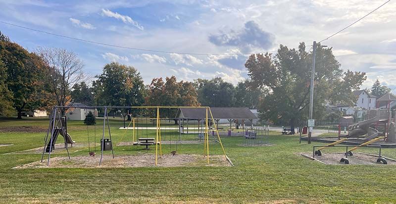 Canal Basin Park playground with swings and slides